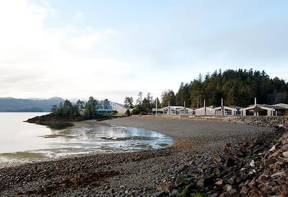 Various buildings sitting by the shore at Haida Gwaii